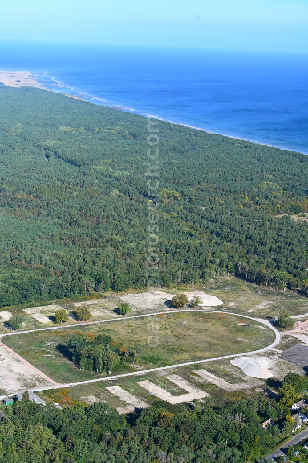 Karlshagen from the bird's eye view: Demolition and clearance work on the building complex of the former military barracks Schuetzenstrasse - Alte Peenemuender Strasse in Karlshagen on the island of Usedom in the state Mecklenburg - Western Pomerania, Germany