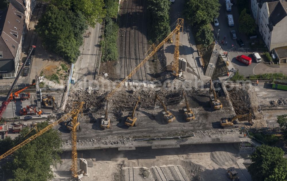 Aerial photograph Essen - View of the demolition of the bridge at the town forest known as the big road to motorway A40 in Essen in North Rhine-Westphalia. The demolition work was carried out on behalf of the State Road Construction North Rhine-Westphalia (Road Authority) by the excavator company F. Beißner GmbH