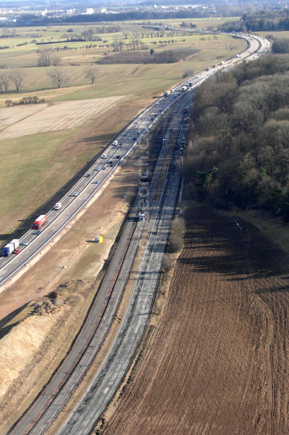 Aerial image Sättelstädt - Blick auf die Abrißarbeiten am alten, stillgelegten Streckenverlauf des A4- Autobahnverlaufes an den Hörselbergen in Thüringen bei Eisenach. Durchgeführt werden die im Zuge dieses Projektes notwendigen Arbeiten unter an derem von der EUROVIA Verkehrsbau Union sowie der Niederlassungen Abbruch und Erdbau, Betonstraßenbau, Ingenieurbau und TECO Schallschutz der EUROVIA Beton sowie der DEGES. View of the demolition work on the old, disused itinerary of the A4 motorway course.