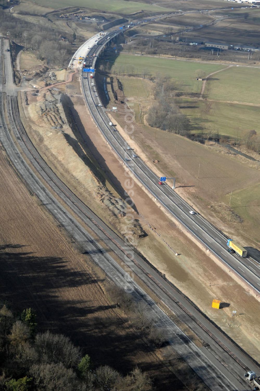 Sättelstädt from above - Blick auf die Abrißarbeiten am alten, stillgelegten Streckenverlauf des A4- Autobahnverlaufes an den Hörselbergen in Thüringen bei Eisenach. Durchgeführt werden die im Zuge dieses Projektes notwendigen Arbeiten unter an derem von der EUROVIA Verkehrsbau Union sowie der Niederlassungen Abbruch und Erdbau, Betonstraßenbau, Ingenieurbau und TECO Schallschutz der EUROVIA Beton sowie der DEGES. View of the demolition work on the old, disused itinerary of the A4 motorway course.