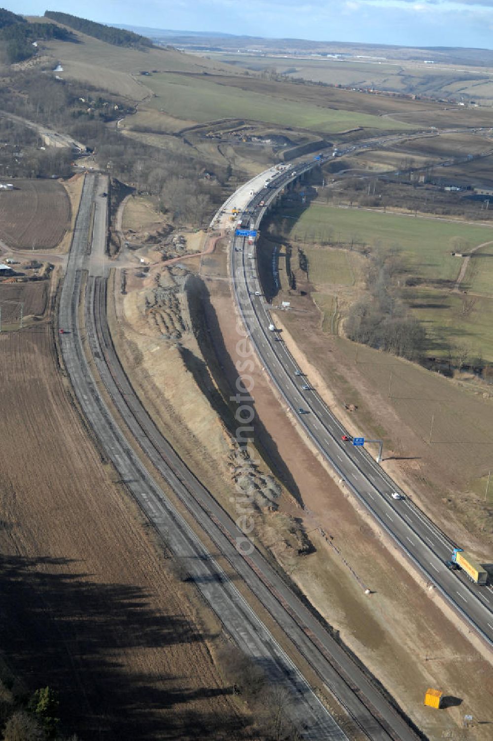 Sättelstädt from the bird's eye view: Blick auf die Abrißarbeiten am alten, stillgelegten Streckenverlauf des A4- Autobahnverlaufes an den Hörselbergen in Thüringen bei Eisenach. Durchgeführt werden die im Zuge dieses Projektes notwendigen Arbeiten unter an derem von der EUROVIA Verkehrsbau Union sowie der Niederlassungen Abbruch und Erdbau, Betonstraßenbau, Ingenieurbau und TECO Schallschutz der EUROVIA Beton sowie der DEGES. View of the demolition work on the old, disused itinerary of the A4 motorway course.