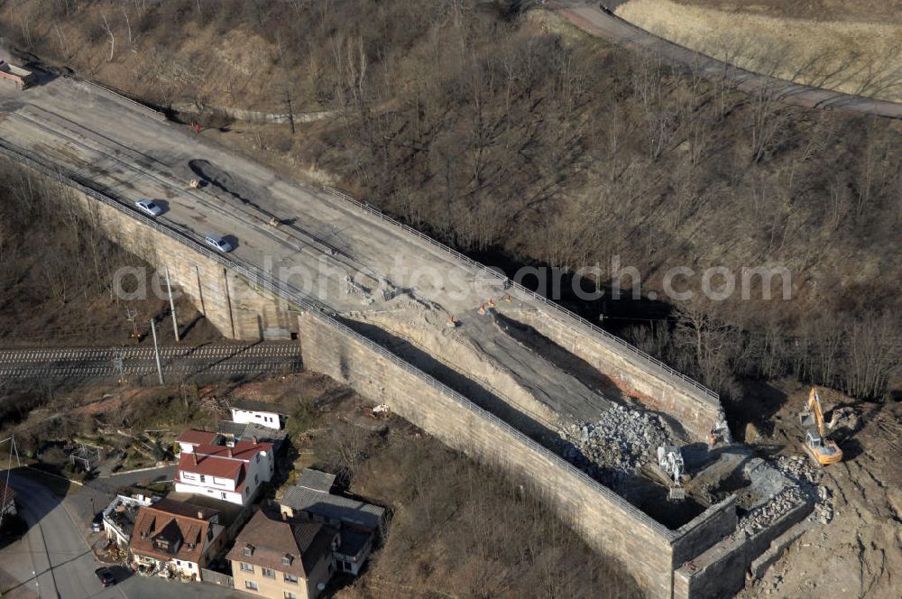 Aerial image Sättelstädt - Blick auf die Abrißarbeiten am alten, stillgelegten Streckenverlauf des A4- Autobahnverlaufes an den Hörselbergen in Thüringen bei Eisenach. Durchgeführt werden die im Zuge dieses Projektes notwendigen Arbeiten unter an derem von der EUROVIA Verkehrsbau Union sowie der Niederlassungen Abbruch und Erdbau, Betonstraßenbau, Ingenieurbau und TECO Schallschutz der EUROVIA Beton sowie der DEGES. View of the demolition work on the old, disused itinerary of the A4 motorway course.