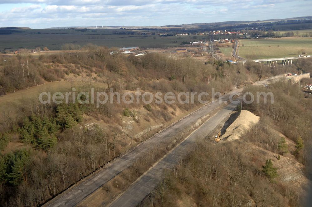 Sättelstädt from above - Blick auf die Abrißarbeiten am alten, stillgelegten Streckenverlauf des A4- Autobahnverlaufes an den Hörselbergen in Thüringen bei Eisenach. Durchgeführt werden die im Zuge dieses Projektes notwendigen Arbeiten unter an derem von der EUROVIA Verkehrsbau Union sowie der Niederlassungen Abbruch und Erdbau, Betonstraßenbau, Ingenieurbau und TECO Schallschutz der EUROVIA Beton sowie der DEGES. View of the demolition work on the old, disused itinerary of the A4 motorway course.