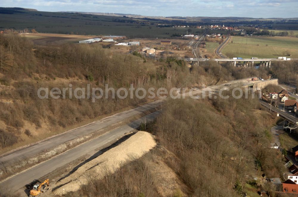 Sättelstädt from the bird's eye view: Blick auf die Abrißarbeiten am alten, stillgelegten Streckenverlauf des A4- Autobahnverlaufes an den Hörselbergen in Thüringen bei Eisenach. Durchgeführt werden die im Zuge dieses Projektes notwendigen Arbeiten unter an derem von der EUROVIA Verkehrsbau Union sowie der Niederlassungen Abbruch und Erdbau, Betonstraßenbau, Ingenieurbau und TECO Schallschutz der EUROVIA Beton sowie der DEGES. View of the demolition work on the old, disused itinerary of the A4 motorway course.