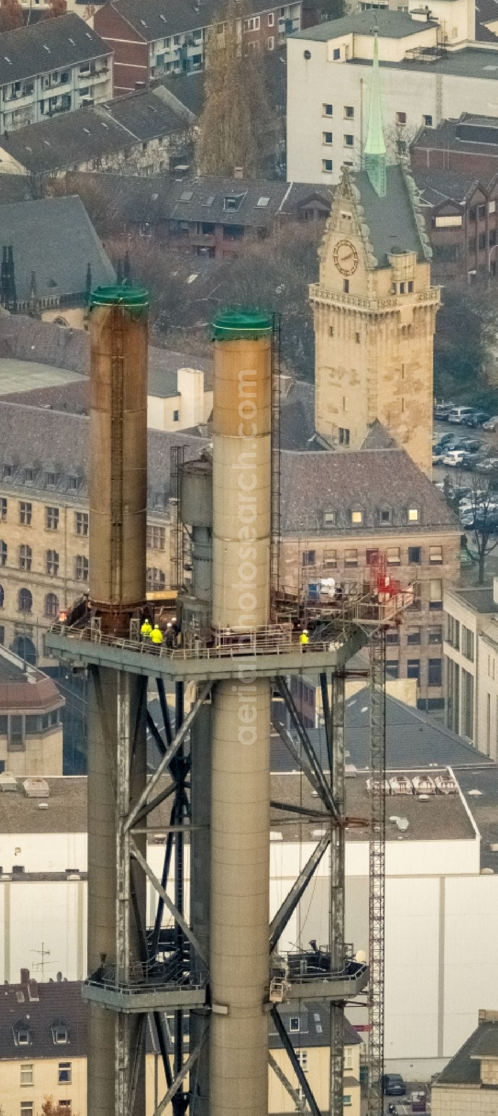 Aerial photograph Duisburg - Demolition work on the tower constructions of industrial chimneys of STADTWERKE DUISBURG on the Charlottenstrasse in the district Altstadt in Duisburg in the state North Rhine-Westphalia