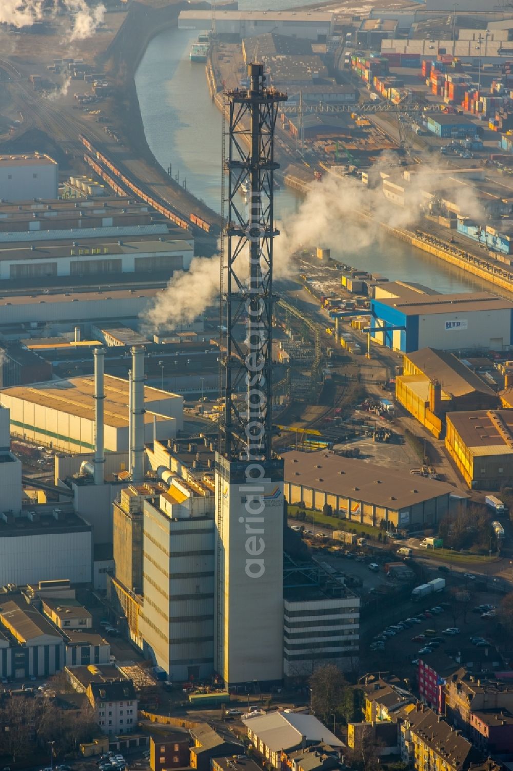 Duisburg from above - Demolition work on the tower constructions of industrial chimneys of STADTWERKE DUISBURG on the Charlottenstrasse in the district Altstadt in Duisburg in the state North Rhine-Westphalia