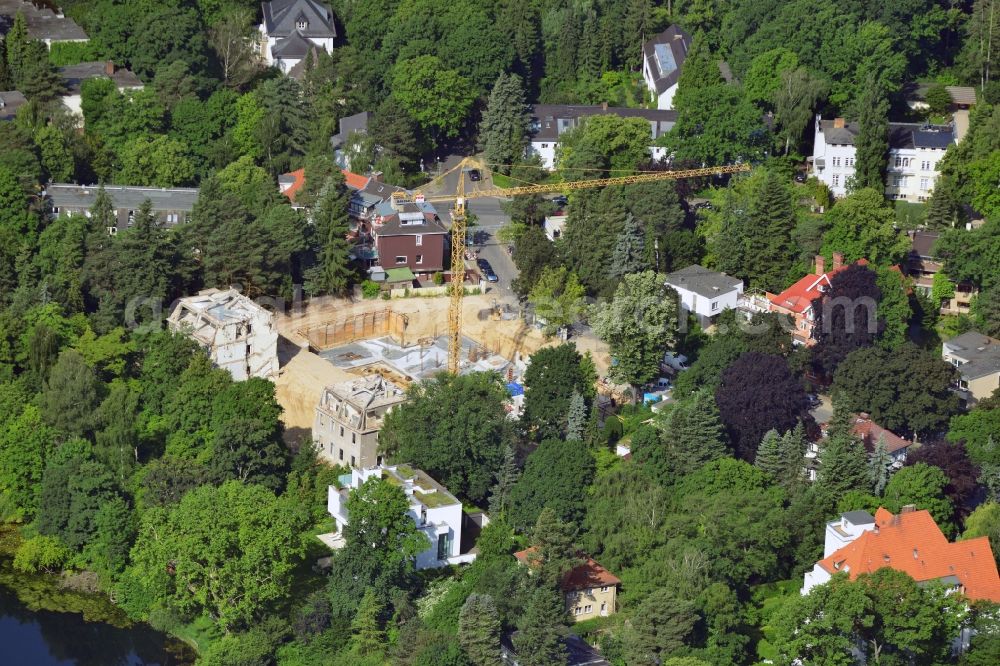 Aerial image Berlin Grunewald - View of the demolition work at the Ullstein - Villa on the Bettinastraße in the Grunewald district in Berlin. In the course of the renovation of the property on the shore of the lake is a new Dianasee Seevilla and other villas in the upper price segment