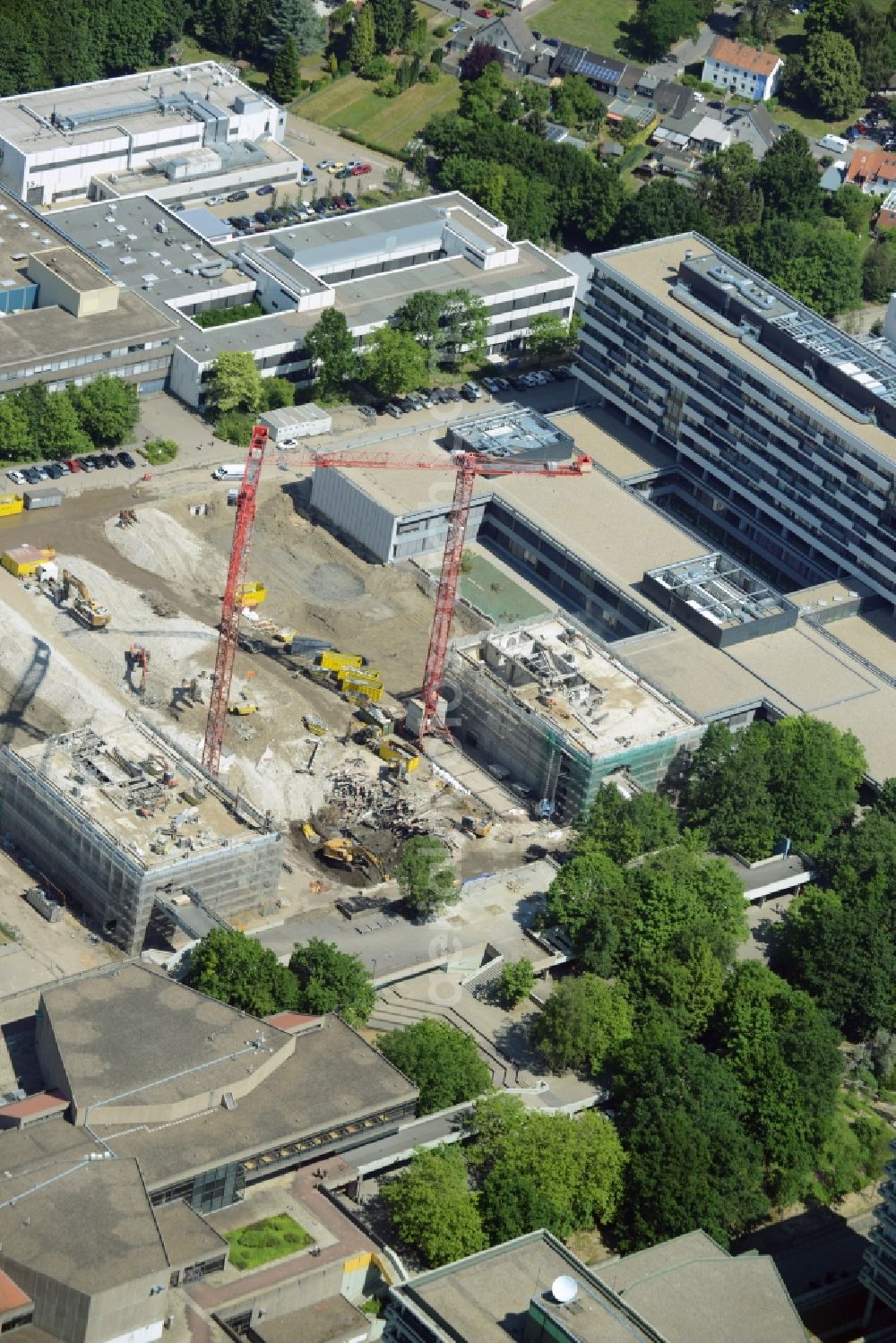 Bochum from the bird's eye view: Demolition work on the campus Ruhr-Universitaet Bochum in North Rhine-Westphalia. The building IA and IB - engineering building of Ruhr University Bochum are due to hazardous PCB - load demolished and rebuilt