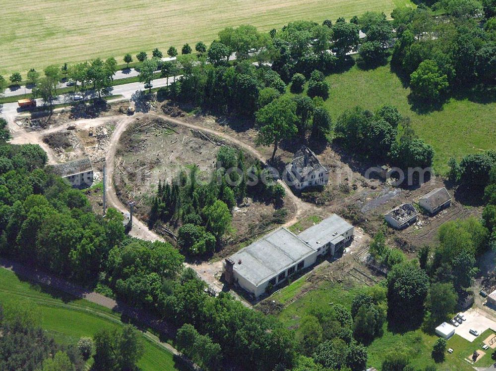 Dahlwitz-Hoppegarten from the bird's eye view: Abrissfläche an den Verwaltungsgebäuden des ehem. Zentralzirkus der DDR an der B1 in Dahlwitz-Hoppegarten. 01.01.1960 Der Zentralzirkus der DDR wird gegründet. Er besteht aus den Zirkussen Busch, Aeros und Berolina