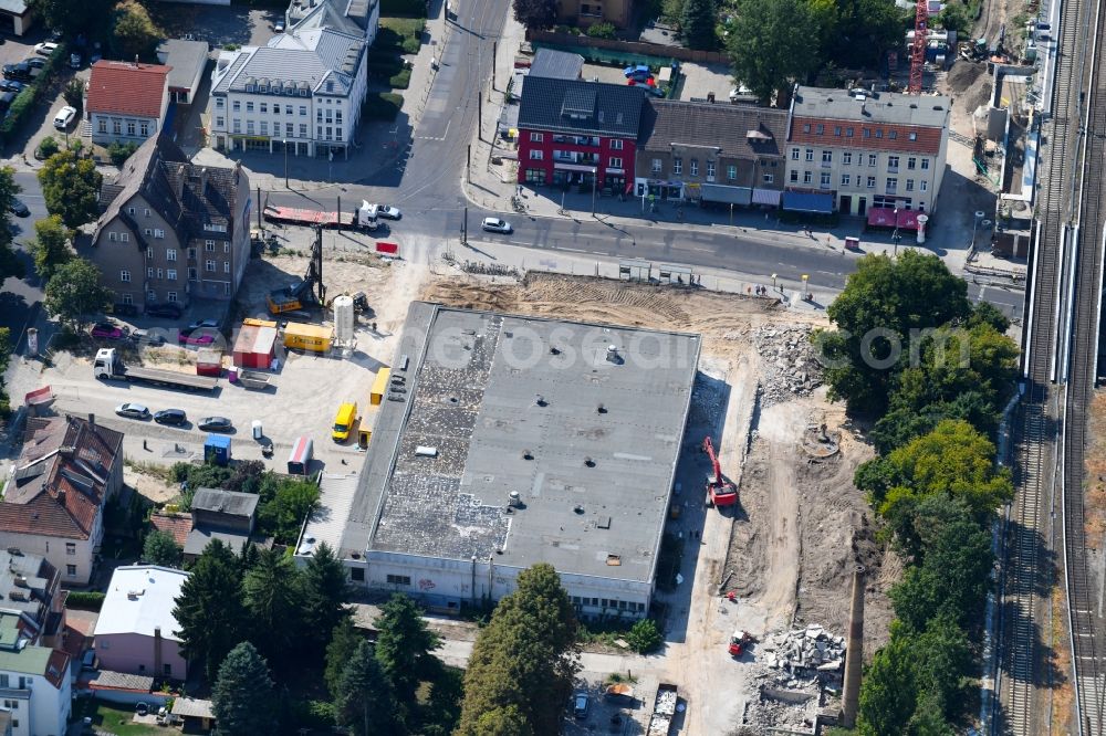 Berlin from the bird's eye view: Demolition work on the ruins of the former store building on Hoenower Strasse in the district Mahlsdorf in Berlin, Germany