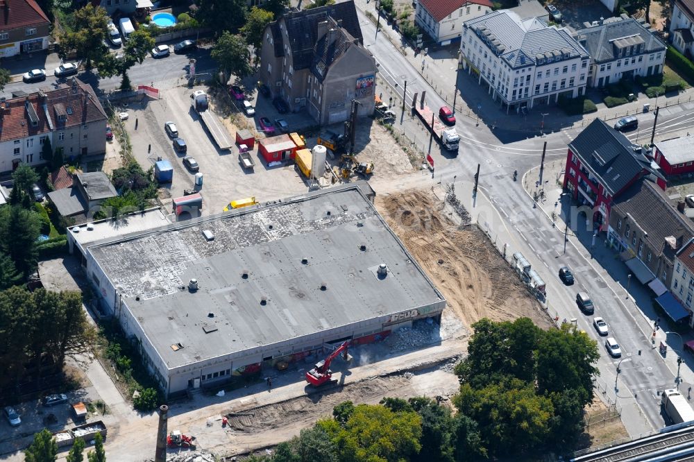 Aerial photograph Berlin - Demolition work on the ruins of the former store building on Hoenower Strasse in the district Mahlsdorf in Berlin, Germany