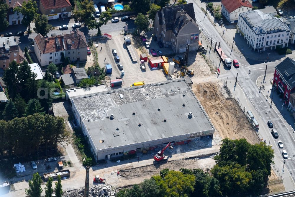 Berlin from above - Demolition work on the ruins of the former store building on Hoenower Strasse in the district Mahlsdorf in Berlin, Germany