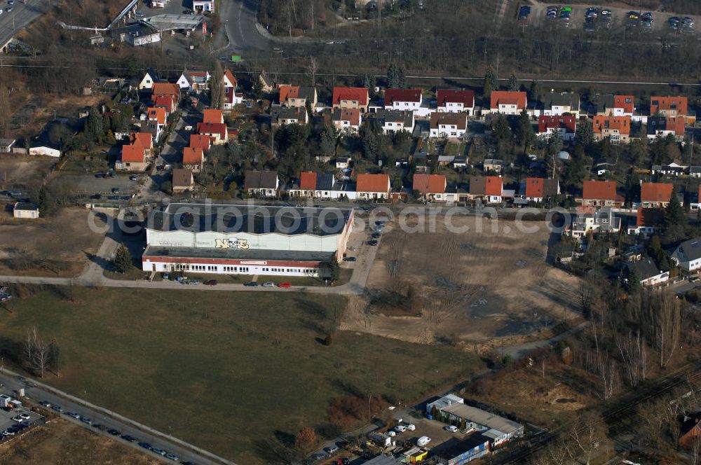 Aerial photograph Berlin - Blick auf die Abrissfläche / den Rückbau vom Haus 9 und Haus 15 (Kesselhaus) auf dem Gelände des Vivantes Klinikum Hellersdorf. Look at the areal surface on the site of the demolished Vivantes Klinikum Berlin - Hellersdorf - Genius Ingenieurbüro GmbH, email: krebs@ibgenius.de