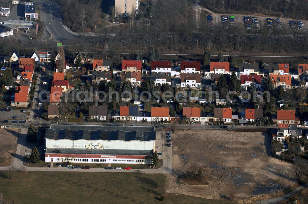 Berlin from the bird's eye view: Blick auf die Abrissfläche / den Rückbau vom Haus 9 und Haus 15 (Kesselhaus) auf dem Gelände des Vivantes Klinikum Hellersdorf. Look at the areal surface on the site of the demolished Vivantes Klinikum Berlin - Hellersdorf - Genius Ingenieurbüro GmbH, email: krebs@ibgenius.de