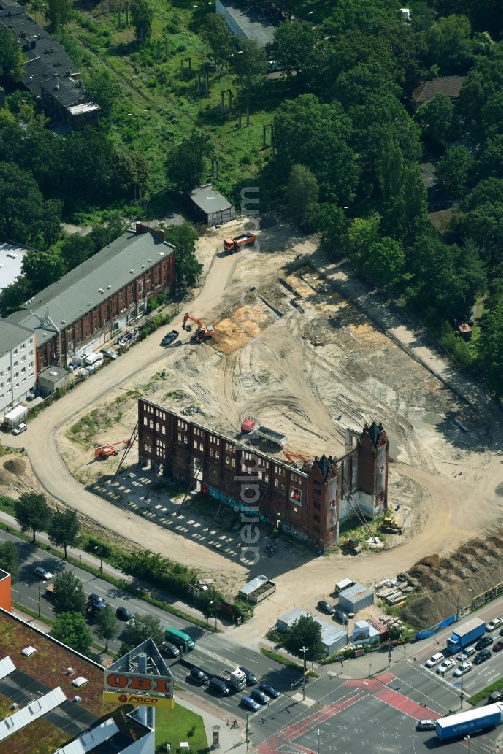 Aerial photograph Berlin - Demolition site of the ruins of the factory building of the former BaerenSiegel distillery on Adlergestell in Adlershof, Berlin. At the construction site of the distinctive production building GDR times development a shopping center
