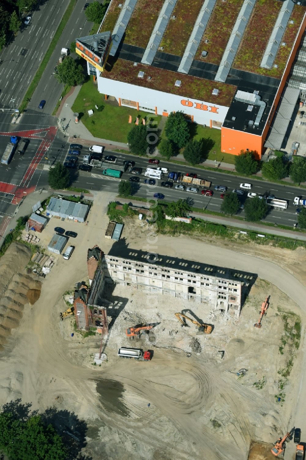 Berlin from the bird's eye view: Demolition site of the ruins of the factory building of the former BaerenSiegel distillery on Adlergestell in Adlershof, Berlin. At the construction site of the distinctive production building GDR times development a shopping center