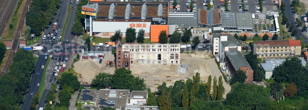 Aerial image Berlin - Demolition site of the ruins of the factory building of the former BaerenSiegel distillery on Adlergestell in Adlershof, Berlin. At the construction site of the distinctive production building GDR times development a shopping center