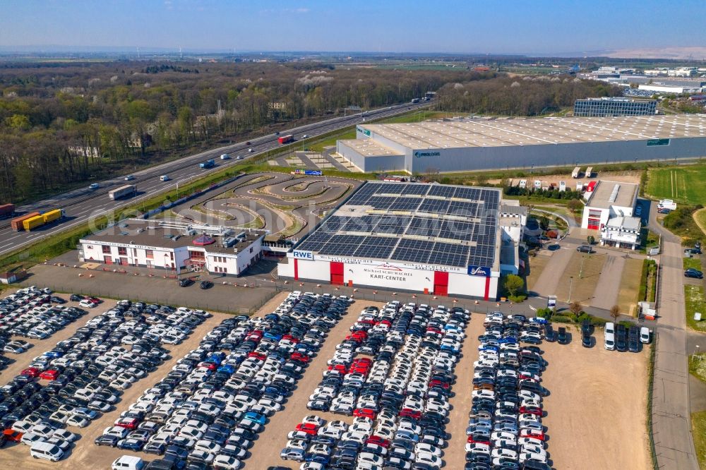 Kerpen from above - Outdoor storage space for new cars - automobiles - cars on Michael Schumacher Kart-Center in the district Sindorf in Kerpen in the state North Rhine-Westphalia, Germany