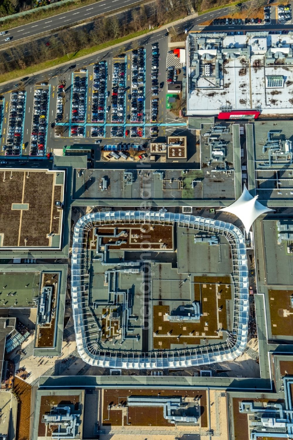 Bochum from above - Parking space for parked cars at the shopping center Ruhr Park in Bochum in the state North Rhine-Westphalia, Germany