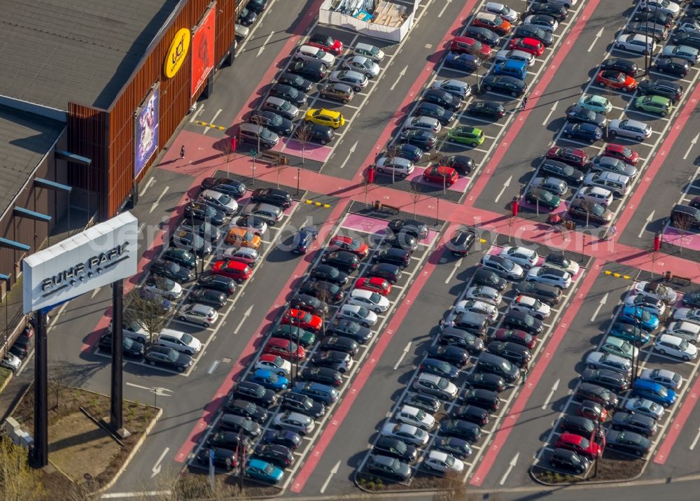 Bochum from above - Parking space for parked cars at the shopping center Ruhr Park in Bochum in the state North Rhine-Westphalia, Germany