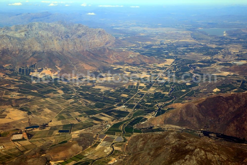 Aerial image Romansrivier - Agricultural landscape with fields for fruits, vegetables and wine grapes in the district Cape Winelands in Romansrivier in Western Cape, South Africa