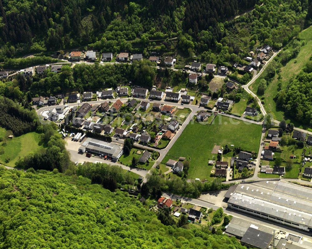 Ahrbrück from above - View of Ahrbrueck in Rheinland-Pfalz. The village is located on the road L85. In the center of Ahrbrueck, there is a large warehouse complex, which belongs to the company Rolladen Berthold Weidenbach