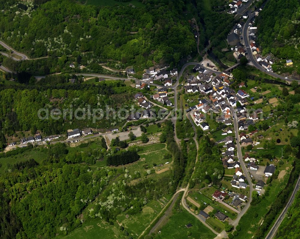 Ahrbrück from the bird's eye view: View of Ahrbrueck in Rheinland-Pfalz. The village is located on the road L85. In the center of Ahrbrueck, there is a large warehouse complex, which belongs to the company Rolladen Berthold Weidenbach