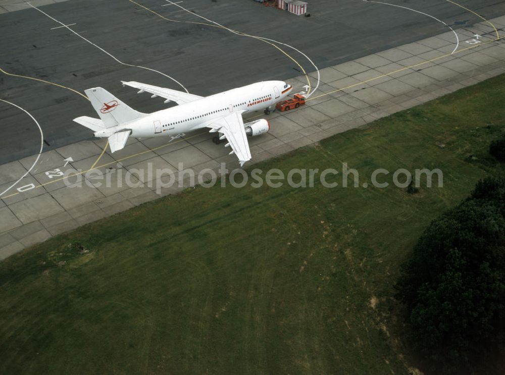 Aerial image Schönefeld - Ein Großraumflugzeug / Passagierflugzeug vom Typ Airbus A310, mit der Kennung D-AOAB, der Interflug auf dem Flughafen Schönefeld bei Berlin.