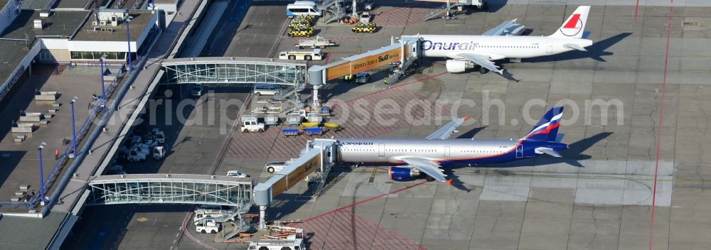 Schönefeld from the bird's eye view: Parking Airbus - Aircraft passenger terminal at the Airport Berlin - Schoenefeld