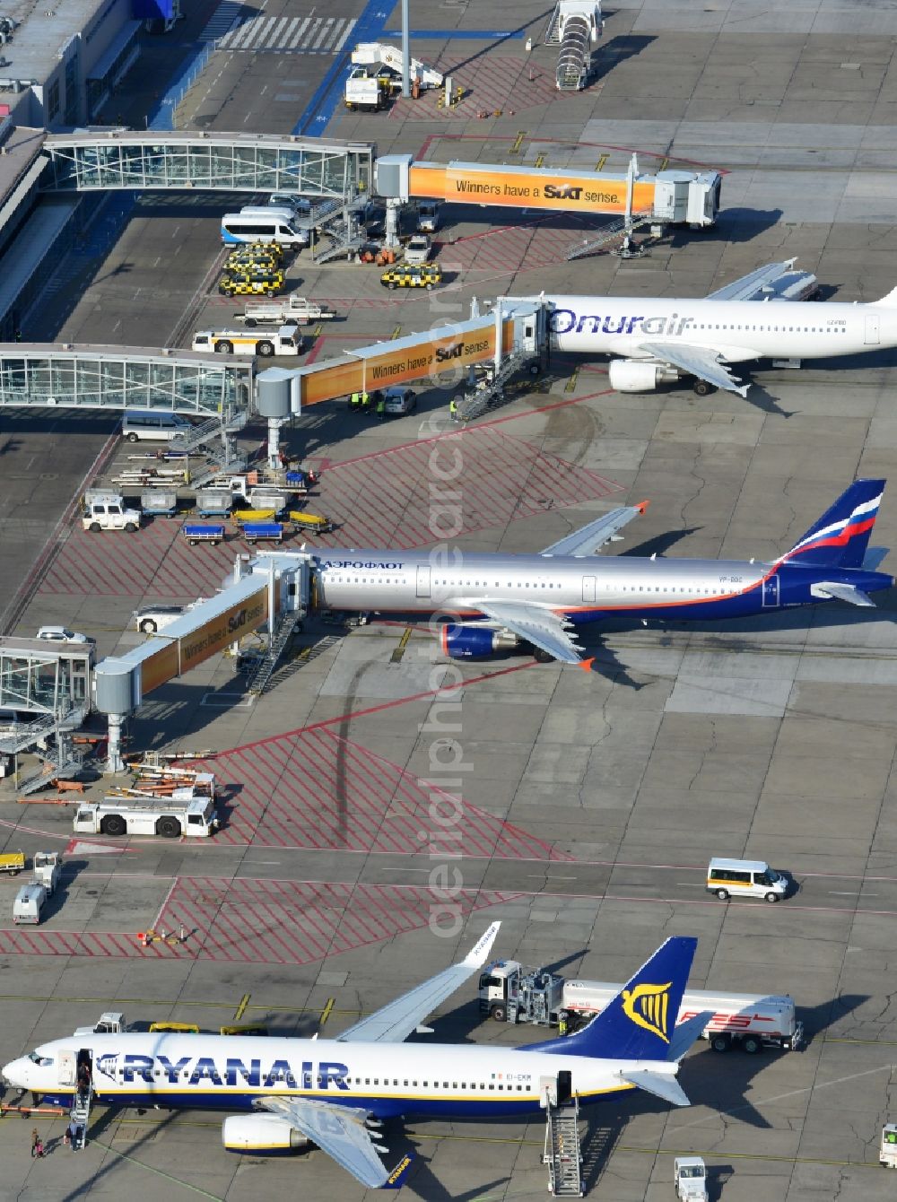 Aerial image Schönefeld - Parking Airbus - Aircraft passenger terminal at the Airport Berlin - Schoenefeld