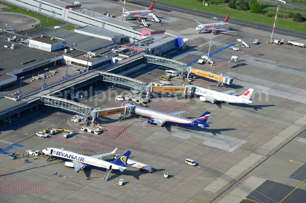 Schönefeld from the bird's eye view: Parking Airbus - Aircraft passenger terminal at the Airport Berlin - Schoenefeld