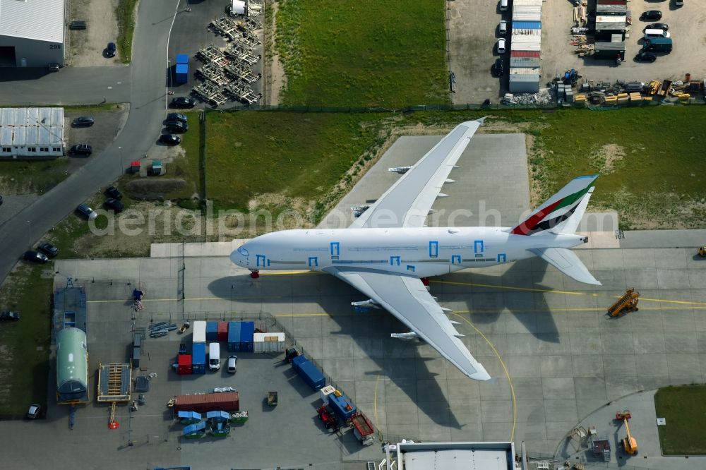 Aerial image Hamburg - Airbus works and airport of Finkenwerder in Hamburg in Germany. The former Hamburger Flugzeugbau works - on the Finkenwerder Peninsula on the riverbank of the Elbe - include an Airbus production site with an airplane. Several Airbus planes and models are being constructed here