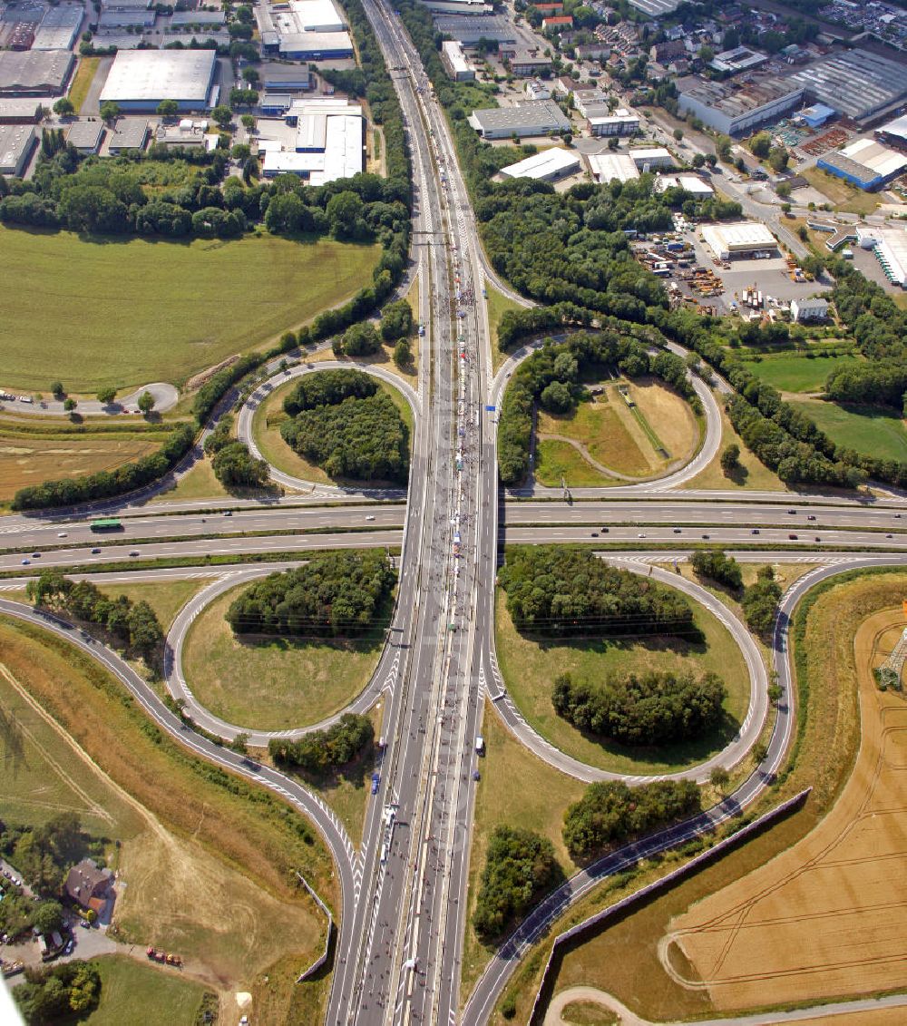 Dortmund from the bird's eye view: Blick auf das Autobahnkreuz Dortmund West der A40 / A45. Der Autobahnbereich ist komplett gesperrt für die Aktion „ Still-Leben “ der Kulturhauptstadt RUHR 2010 statt. Auf einer Strecke von fast 60 Kilometern bilden 20.000 Tische die nach Angaben der Veranstalter laengste Tafel der Welt. View of the highway crossing Dortmund West A40 / A45. The highway section is completely closed to the action Still-life of the Ruhr Culture 2010. On a stretch of nearly 60 kilometers form the longest 20 000 tables, according to the organizer panel in the world.