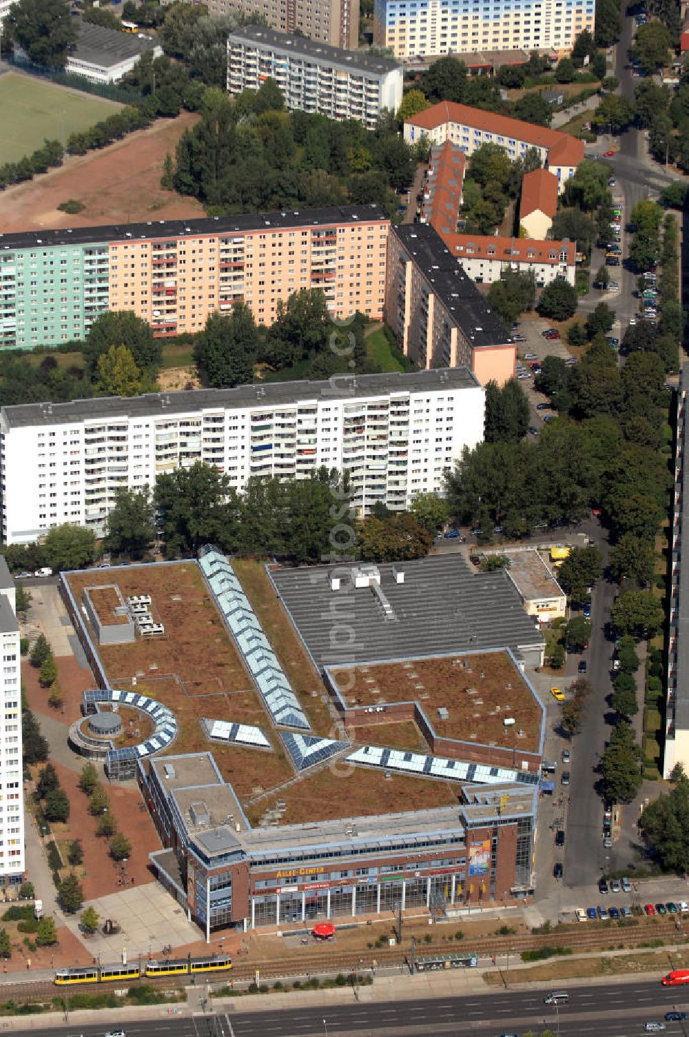 Aerial photograph Berlin - Blick auf das Allee-Center in Berlin-Lichtenberg. Es ist ein Projekt der ECE Projektmanagement GmbH und liegt an der Landsberger Allee 227 / Genslerstraße. Auf 12.300qm werden 50 Fachgeschäfte, Discounter, Gastronomie u.ä. angeboten. Kontakt: