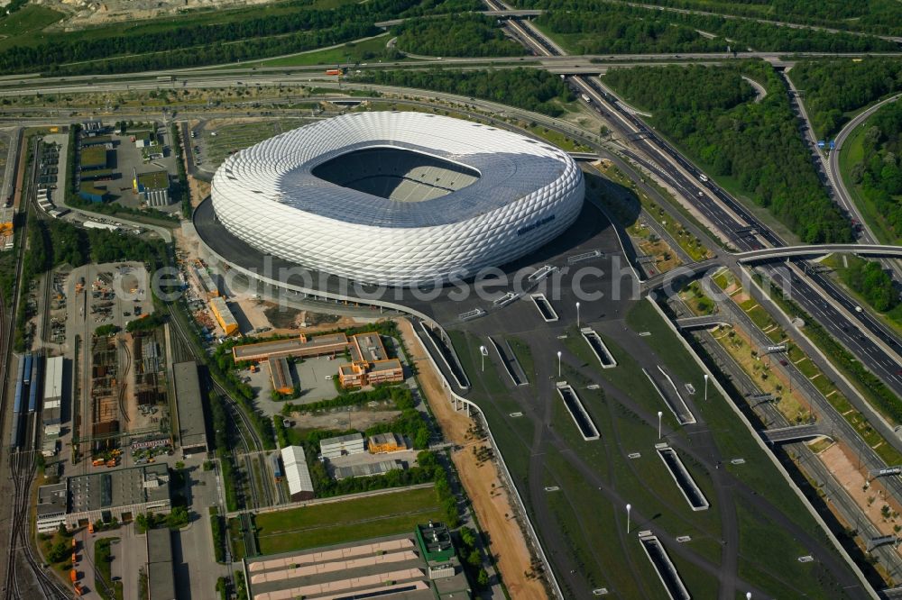 Aerial image München - The Allianz Arena in Munich in Bavaria is a football stadium of the the Munich football club FC Bayern Muenchen. The facade of the, designed by the architects Herzog & de Meuron stadium Allianz Arena Muenchen Stadion GmbH consists of illuminated white foil cushions