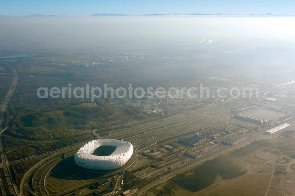 Aerial image München - The Allianz Arena in Munich in Bavaria is a football stadium of the the Munich football club FC Bayern Muenchen. The facade of the, designed by the architects Herzog & de Meuron stadium Allianz Arena Muenchen Stadion GmbH consists of illuminated white foil cushions