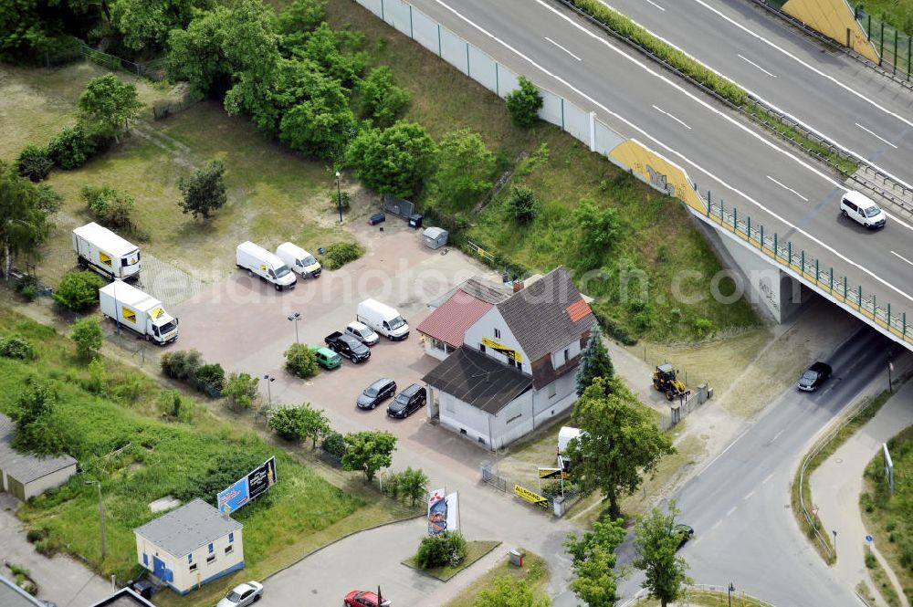 Aerial photograph Bernau - Blick Allround-Autovermietung auf die Autobahnbrücke der A11 über die Zepernicker Chaussee. View above the Allround Car-Rental to the motorway bridge about the Zepernicker Chaussee.