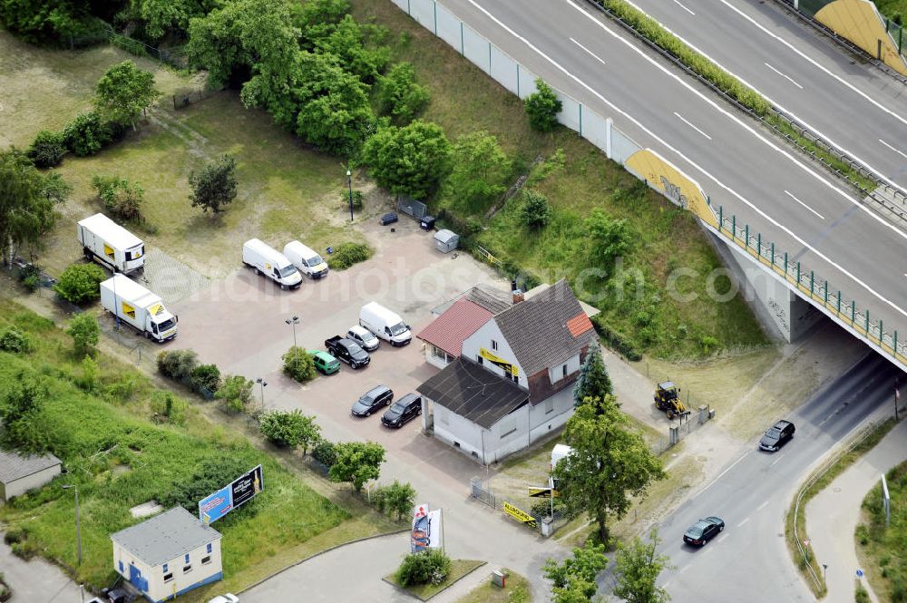 Bernau from above - Blick Allround-Autovermietung auf die Autobahnbrücke der A11 über die Zepernicker Chaussee. View above the Allround Car-Rental to the motorway bridge about the Zepernicker Chaussee.