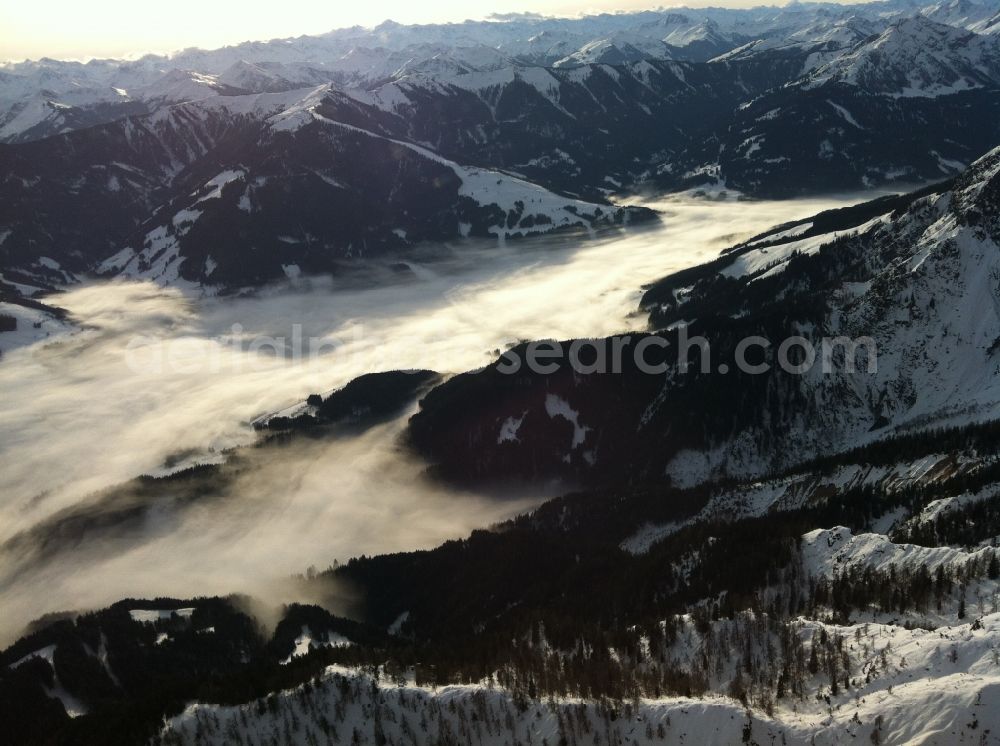 Aerial photograph Saalfelden am Steinernen Meer - Valley in the alps with fog in Saalfelden Austria