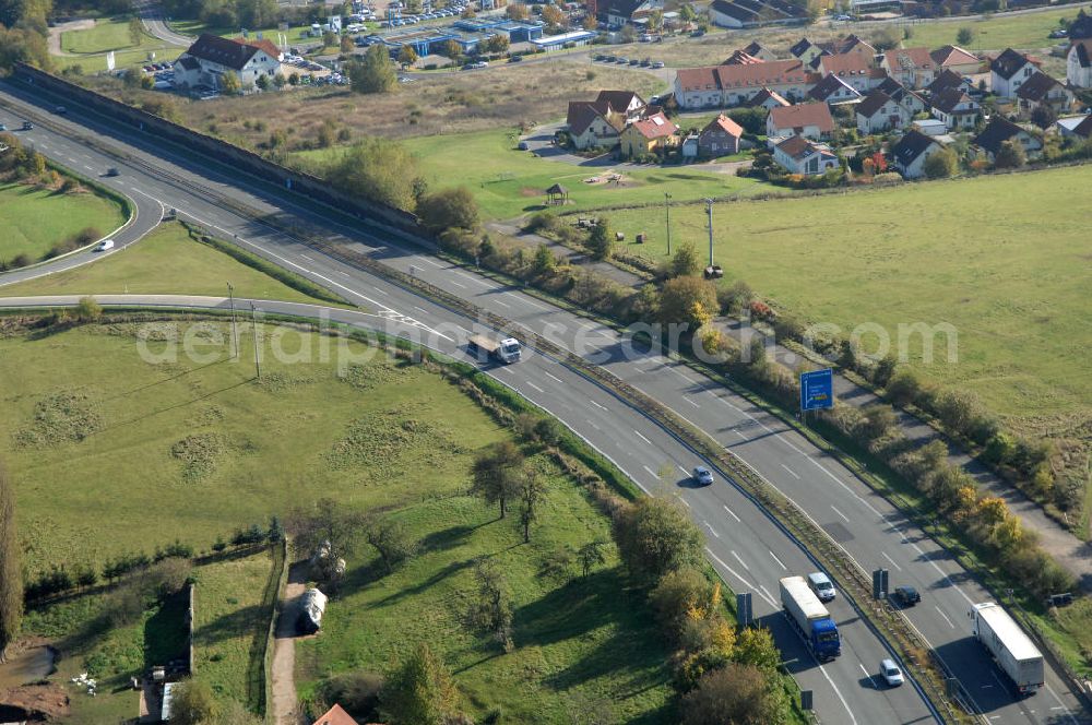 Aerial photograph Eisenach - Blick auf den bisherigen Verlauf der Autobahn / A 4 bei Eisenach über die Hörselberge. Dieser Trassen-Abschnitt soll nach der Inbetriebnahme der neu gebauten A4-Umfahrung ab Januar nächsten Jahres zurück gebaut und teilweise renaturiert werden. Durchgeführt werden die im Zuge dieses Projektes notwendigen Arbeiten unter an derem von den Mitarbeitern der Niederlassung Weimar der EUROVIA Verkehrsbau Union sowie der Niederlassungen Abbruch und Erdbau, Betonstraßenbau, Ingenieurbau und TECO Schallschutz der EUROVIA Beton sowie der DEGES.