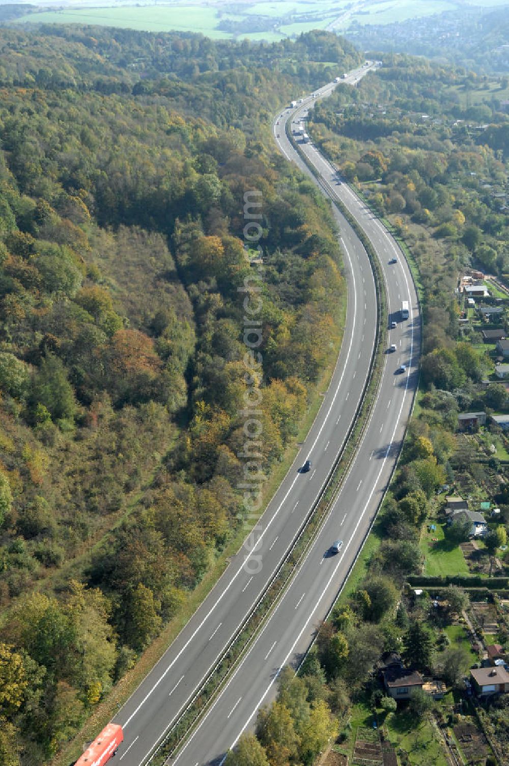 Eisenach from the bird's eye view: Blick auf den bisherigen Verlauf der Autobahn / A 4 bei Eisenach über die Hörselberge. Dieser Trassen-Abschnitt soll nach der Inbetriebnahme der neu gebauten A4-Umfahrung ab Januar nächsten Jahres zurück gebaut und teilweise renaturiert werden. Durchgeführt werden die im Zuge dieses Projektes notwendigen Arbeiten unter an derem von den Mitarbeitern der Niederlassung Weimar der EUROVIA Verkehrsbau Union sowie der Niederlassungen Abbruch und Erdbau, Betonstraßenbau, Ingenieurbau und TECO Schallschutz der EUROVIA Beton sowie der DEGES.