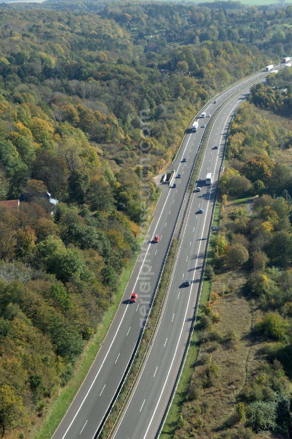 Aerial photograph Eisenach - Blick auf den bisherigen Verlauf der Autobahn / A 4 bei Eisenach über die Hörselberge. Dieser Trassen-Abschnitt soll nach der Inbetriebnahme der neu gebauten A4-Umfahrung ab Januar nächsten Jahres zurück gebaut und teilweise renaturiert werden. Durchgeführt werden die im Zuge dieses Projektes notwendigen Arbeiten unter an derem von den Mitarbeitern der Niederlassung Weimar der EUROVIA Verkehrsbau Union sowie der Niederlassungen Abbruch und Erdbau, Betonstraßenbau, Ingenieurbau und TECO Schallschutz der EUROVIA Beton sowie der DEGES.