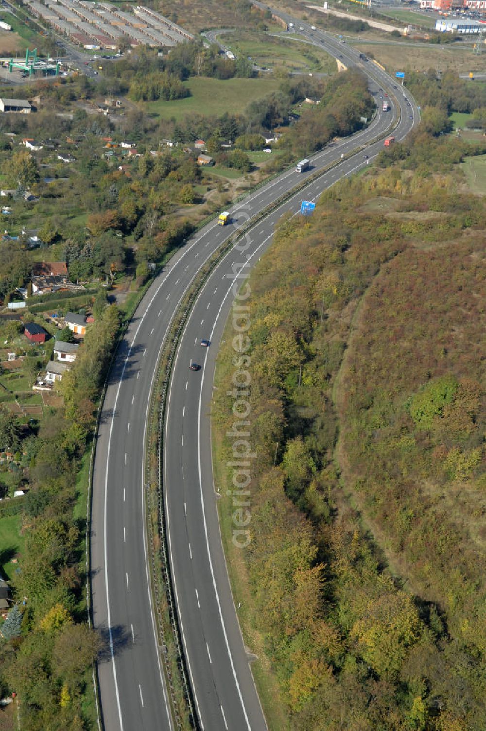 Aerial photograph Eisenach - Blick auf den bisherigen Verlauf der Autobahn / A 4 bei Eisenach über die Hörselberge. Dieser Trassen-Abschnitt soll nach der Inbetriebnahme der neu gebauten A4-Umfahrung ab Januar nächsten Jahres zurück gebaut und teilweise renaturiert werden. Durchgeführt werden die im Zuge dieses Projektes notwendigen Arbeiten unter an derem von den Mitarbeitern der Niederlassung Weimar der EUROVIA Verkehrsbau Union sowie der Niederlassungen Abbruch und Erdbau, Betonstraßenbau, Ingenieurbau und TECO Schallschutz der EUROVIA Beton sowie der DEGES.