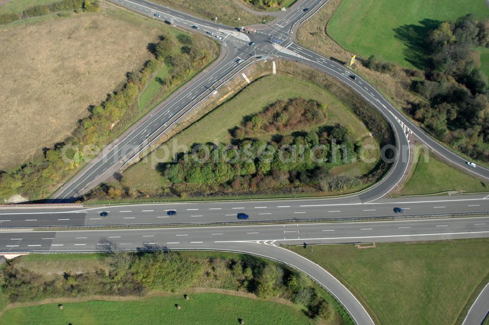 Aerial photograph Eisenach - Blick auf den bisherigen Verlauf der Autobahn / A 4 bei Eisenach über die Hörselberge. Dieser Trassen-Abschnitt soll nach der Inbetriebnahme der neu gebauten A4-Umfahrung ab Januar nächsten Jahres zurück gebaut und teilweise renaturiert werden. Durchgeführt werden die im Zuge dieses Projektes notwendigen Arbeiten unter an derem von den Mitarbeitern der Niederlassung Weimar der EUROVIA Verkehrsbau Union sowie der Niederlassungen Abbruch und Erdbau, Betonstraßenbau, Ingenieurbau und TECO Schallschutz der EUROVIA Beton sowie der DEGES.