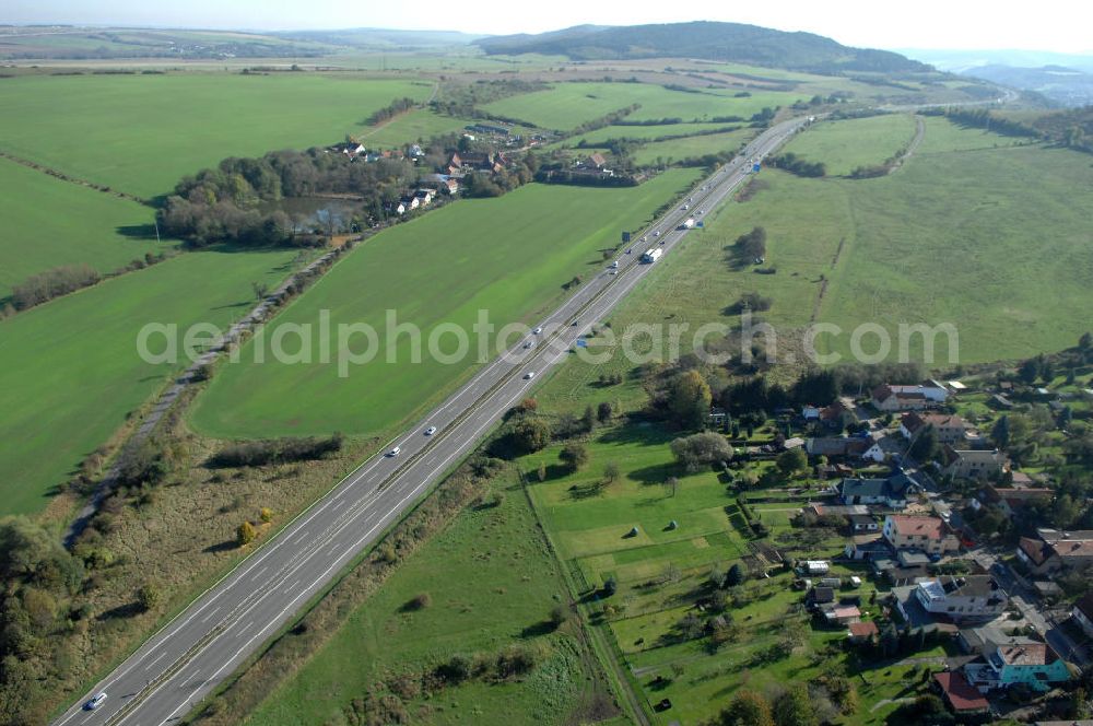 Eisenach from the bird's eye view: Blick auf den bisherigen Verlauf der Autobahn / A 4 bei Eisenach über die Hörselberge. Dieser Trassen-Abschnitt soll nach der Inbetriebnahme der neu gebauten A4-Umfahrung ab Januar nächsten Jahres zurück gebaut und teilweise renaturiert werden. Durchgeführt werden die im Zuge dieses Projektes notwendigen Arbeiten unter an derem von den Mitarbeitern der Niederlassung Weimar der EUROVIA Verkehrsbau Union sowie der Niederlassungen Abbruch und Erdbau, Betonstraßenbau, Ingenieurbau und TECO Schallschutz der EUROVIA Beton sowie der DEGES.