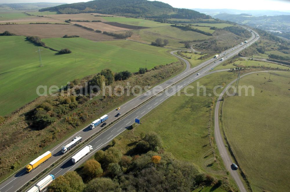 Aerial photograph Eisenach - Blick auf den bisherigen Verlauf der Autobahn / A 4 bei Eisenach über die Hörselberge. Dieser Trassen-Abschnitt soll nach der Inbetriebnahme der neu gebauten A4-Umfahrung ab Januar nächsten Jahres zurück gebaut und teilweise renaturiert werden. Durchgeführt werden die im Zuge dieses Projektes notwendigen Arbeiten unter an derem von den Mitarbeitern der Niederlassung Weimar der EUROVIA Verkehrsbau Union sowie der Niederlassungen Abbruch und Erdbau, Betonstraßenbau, Ingenieurbau und TECO Schallschutz der EUROVIA Beton sowie der DEGES.