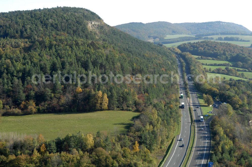 Eisenach from the bird's eye view: Blick auf den bisherigen Verlauf der Autobahn / A 4 bei Eisenach über die Hörselberge. Dieser Trassen-Abschnitt soll nach der Inbetriebnahme der neu gebauten A4-Umfahrung ab Januar nächsten Jahres zurück gebaut und teilweise renaturiert werden. Durchgeführt werden die im Zuge dieses Projektes notwendigen Arbeiten unter an derem von den Mitarbeitern der Niederlassung Weimar der EUROVIA Verkehrsbau Union sowie der Niederlassungen Abbruch und Erdbau, Betonstraßenbau, Ingenieurbau und TECO Schallschutz der EUROVIA Beton sowie der DEGES.