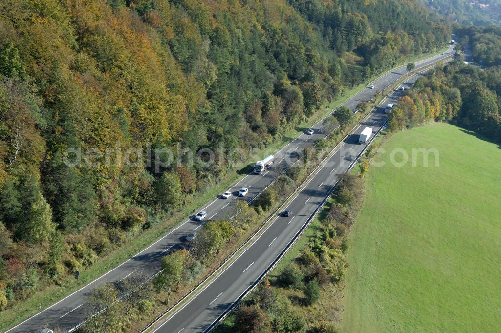 Aerial photograph Eisenach - Blick auf den bisherigen Verlauf der Autobahn / A 4 bei Eisenach über die Hörselberge. Dieser Trassen-Abschnitt soll nach der Inbetriebnahme der neu gebauten A4-Umfahrung ab Januar nächsten Jahres zurück gebaut und teilweise renaturiert werden. Durchgeführt werden die im Zuge dieses Projektes notwendigen Arbeiten unter an derem von den Mitarbeitern der Niederlassung Weimar der EUROVIA Verkehrsbau Union sowie der Niederlassungen Abbruch und Erdbau, Betonstraßenbau, Ingenieurbau und TECO Schallschutz der EUROVIA Beton sowie der DEGES.