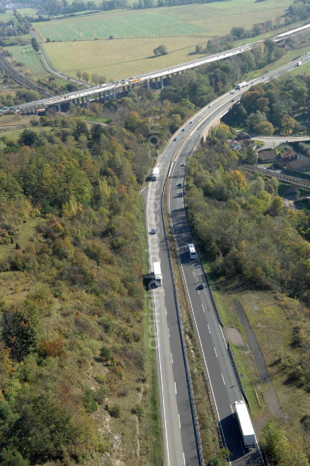 Aerial photograph Eisenach - Blick auf den bisherigen Verlauf der Autobahn / A 4 bei Eisenach über die Hörselberge. Dieser Trassen-Abschnitt soll nach der Inbetriebnahme der neu gebauten A4-Umfahrung ab Januar nächsten Jahres zurück gebaut und teilweise renaturiert werden. Durchgeführt werden die im Zuge dieses Projektes notwendigen Arbeiten unter an derem von den Mitarbeitern der Niederlassung Weimar der EUROVIA Verkehrsbau Union sowie der Niederlassungen Abbruch und Erdbau, Betonstraßenbau, Ingenieurbau und TECO Schallschutz der EUROVIA Beton sowie der DEGES.