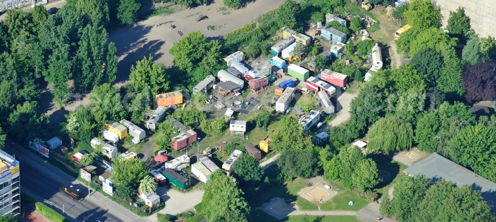 Berlin from above - Wagon camp - caravan and tent - campsite - and tent site of the alternative sceneon the former RAW site on street Revaler Strasse in Berlin, Germany